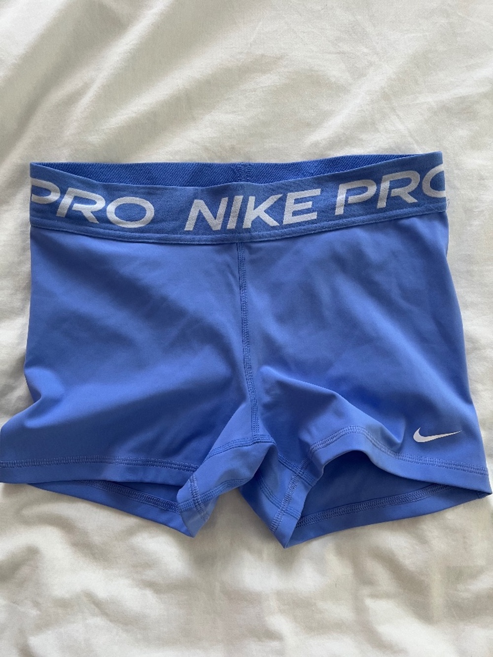 Blue Nike Pro shorts
